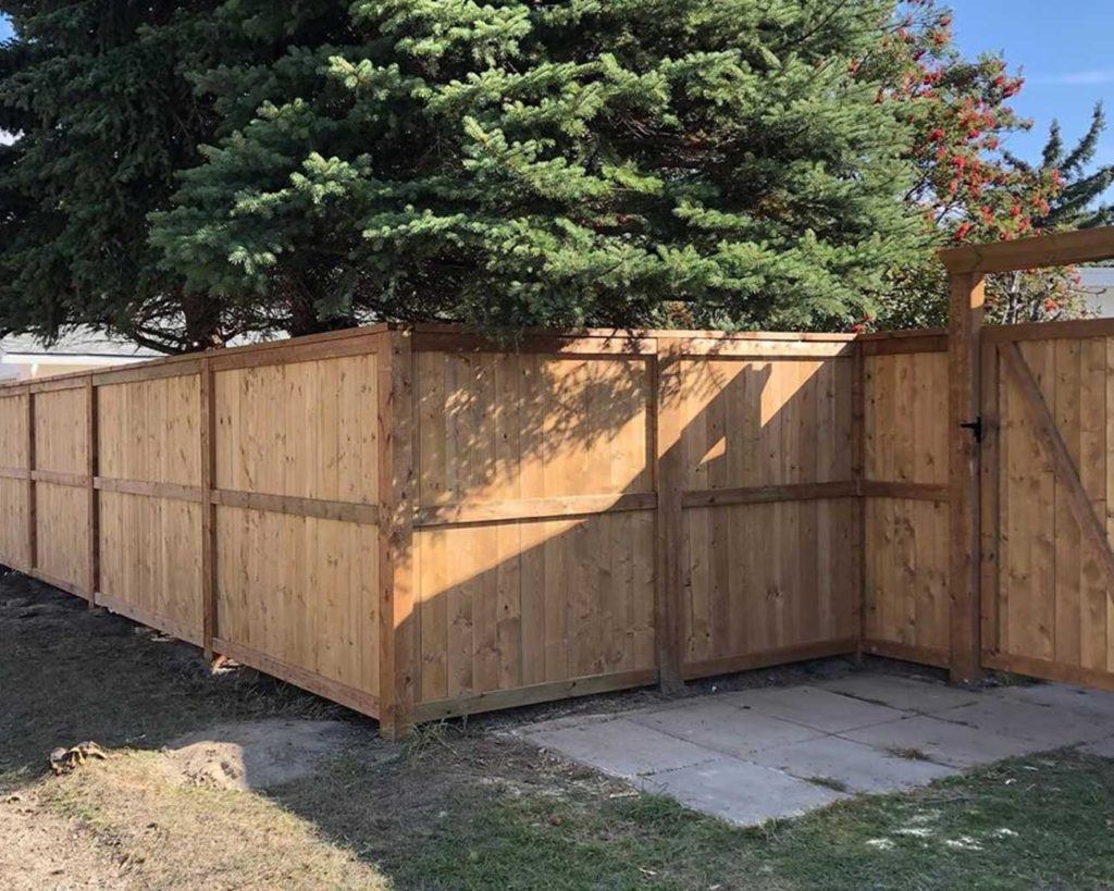 a wooden fence with a gate